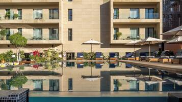 Outdoor pool, open 8:00 AM to 7:00 PM, pool umbrellas, sun loungers