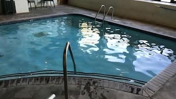 Indoor pool, seasonal outdoor pool, open 8 AM to 8 PM, pool loungers