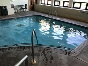 Indoor pool, seasonal outdoor pool, open 8 AM to 8 PM, sun loungers