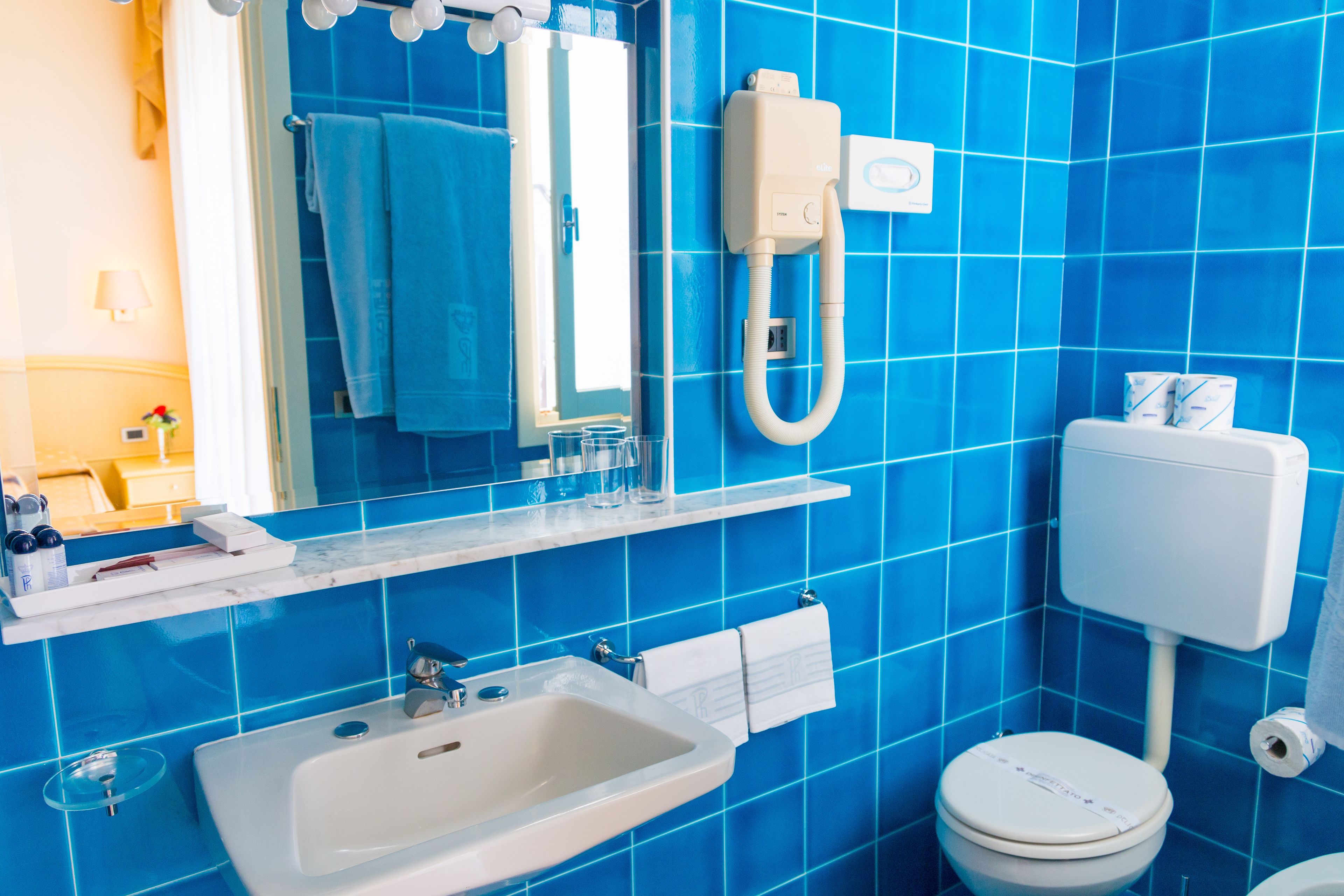 deep-soaking bathtub, bidet, towels