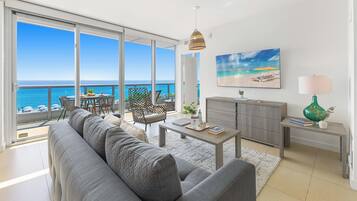 Superior Apartment, 1 Bedroom, Balcony, Oceanfront | Living area | 50-inch Smart TV with digital channels, streaming services