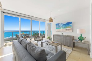 Superior Apartment, 1 Bedroom, Balcony, Oceanfront | Living area | 50-inch Smart TV with digital channels, streaming services
