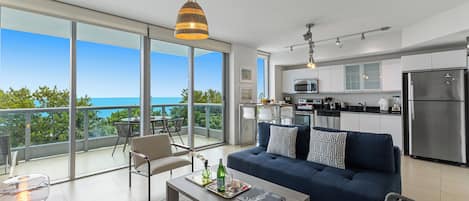 Superior Apartment, 1 Bedroom, Partial Ocean View | Living area | 50-inch Smart TV with digital channels, streaming services