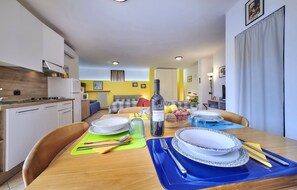 Family Studio, Kitchen, Ground Floor | Free WiFi, bed sheets - B&B Casa Della Musica Lake View (Mandello del Lario)