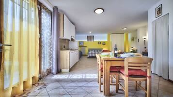 Family Studio, Kitchen, Ground Floor | Free WiFi, bed sheets