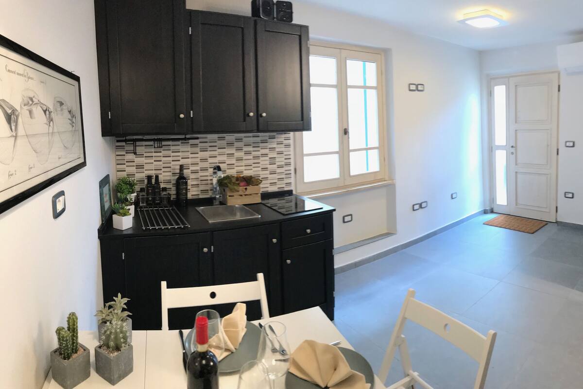 family apartment, 2 bedrooms, non smoking, kitchen (appartamento nel borgo) | living area | 40-inch led tv with satellite channels, tv