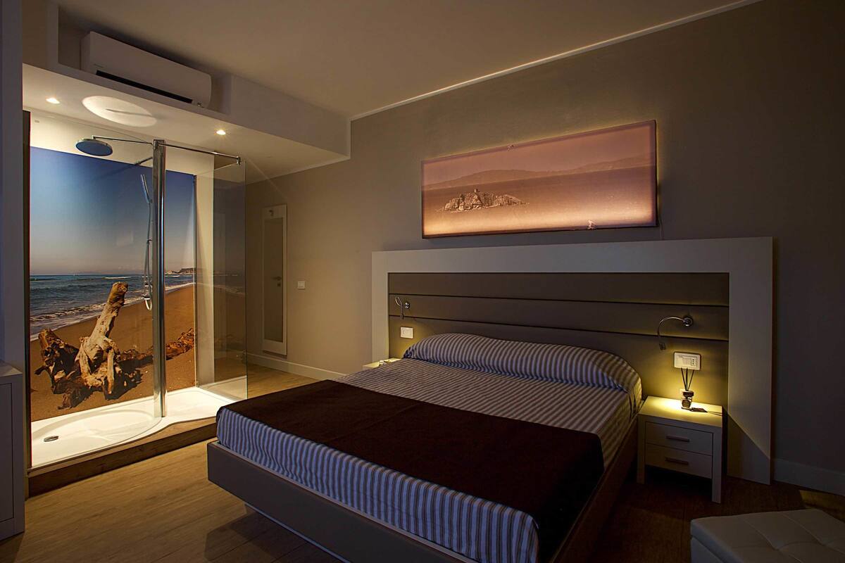 deluxe suite, 1 king bed with sofa bed, kitchenette, valley view | frette italian sheets, premium bedding, pillow-top beds, minibar