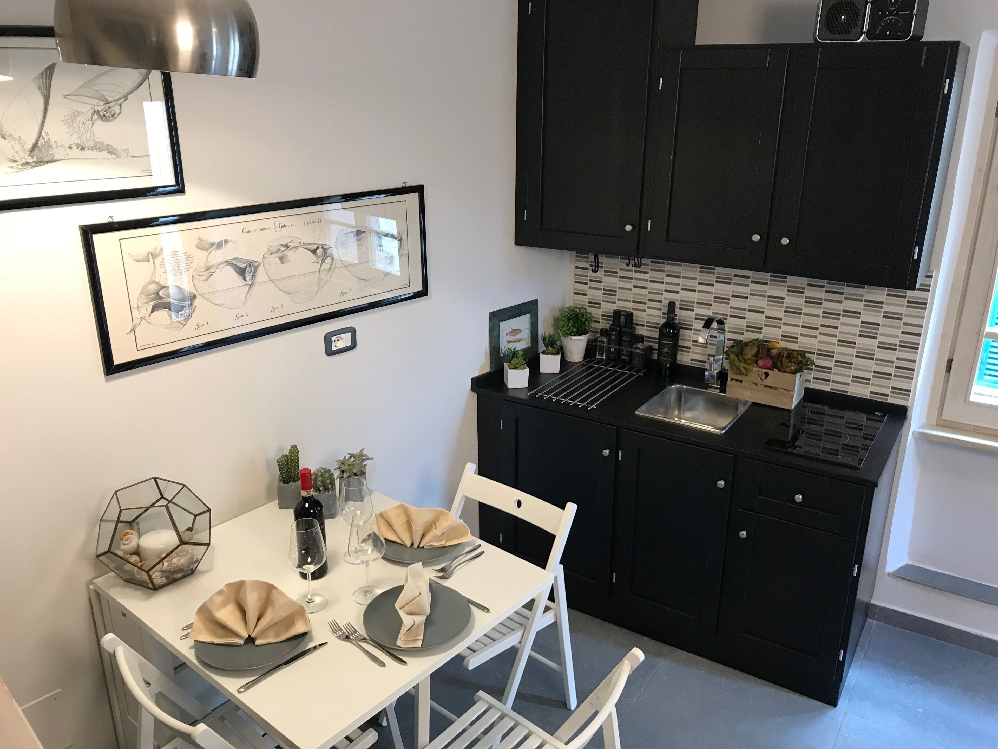 family apartment, 2 bedrooms, non smoking, kitchen (appartamento nel borgo) | living area | 40-inch led tv with satellite channels, tv