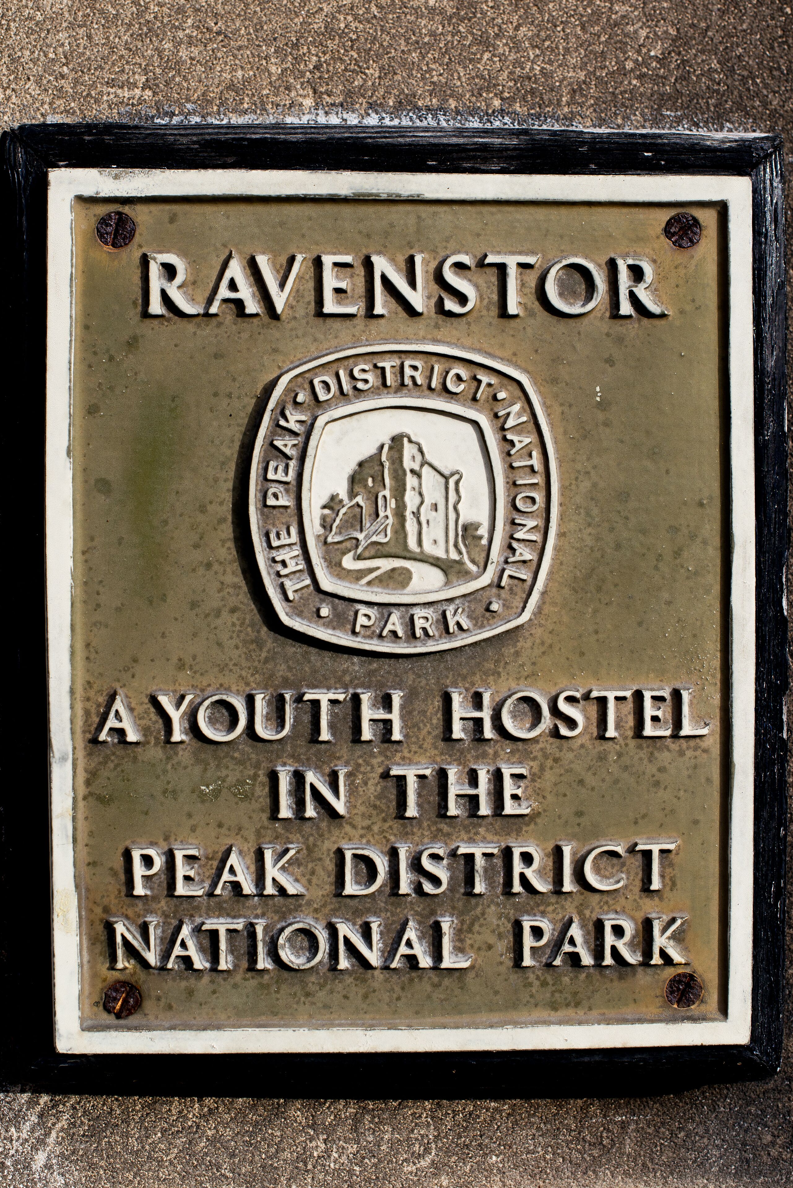 A plaque indicating the location of the Ravensthor Youth Hostel in the Peak District National Park.