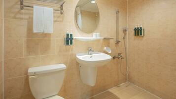Shower, hair dryer, slippers, towels