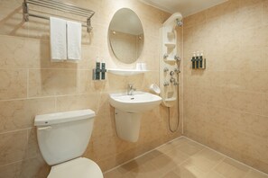 Shower, hair dryer, slippers, towels