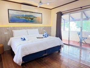 Room, Sea View | Minibar, in-room safe, desk, blackout drapes
