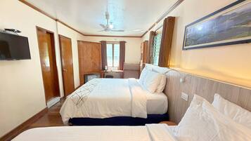 Room, Sea View | Minibar, in-room safe, desk, blackout drapes