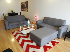 Lägenhet - 3 sovrum | Vardagsrum | Platt-tv