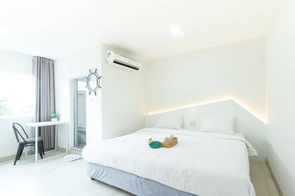 Habitación doble Deluxe | Artículos del minibar gratis y caja de seguridad en la habitación