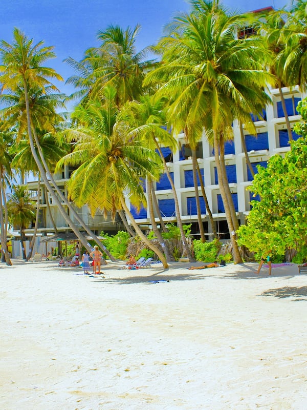 Beach nearby, white sand, beach umbrellas, beach towels