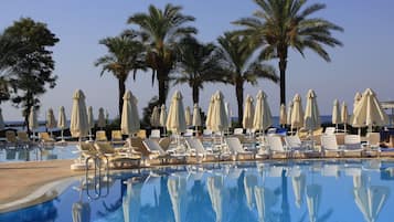 2 outdoor pools, open 7:00 AM to 8:00 PM, pool umbrellas, sun loungers