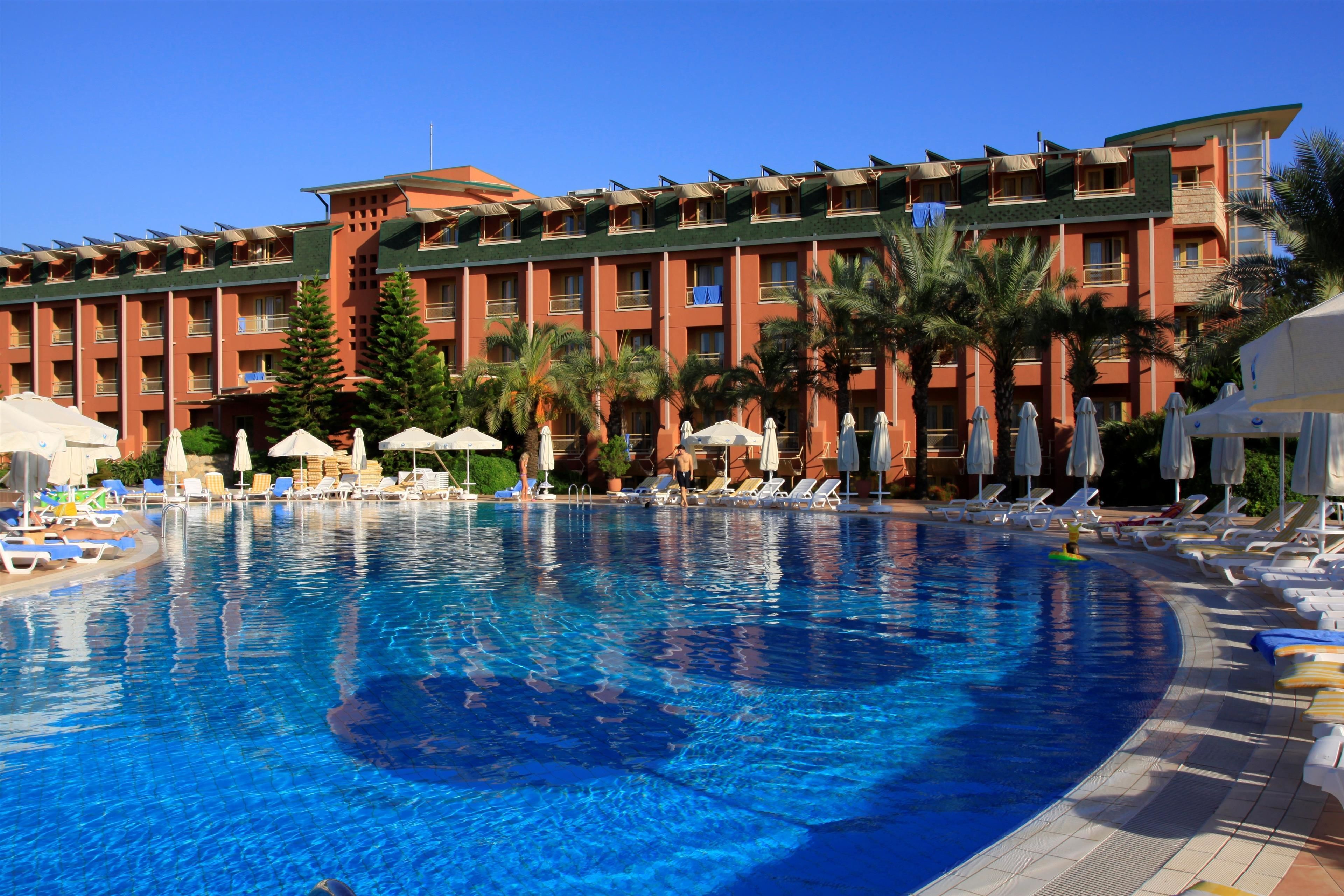 2 outdoor pools, open 7:00 am to 8:00 pm, pool umbrellas, pool loungers