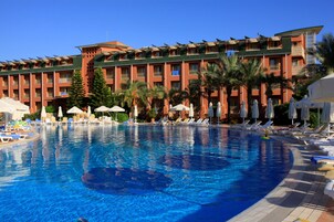2 outdoor pools, open 7:00 AM to 8:00 PM, pool umbrellas, sun loungers