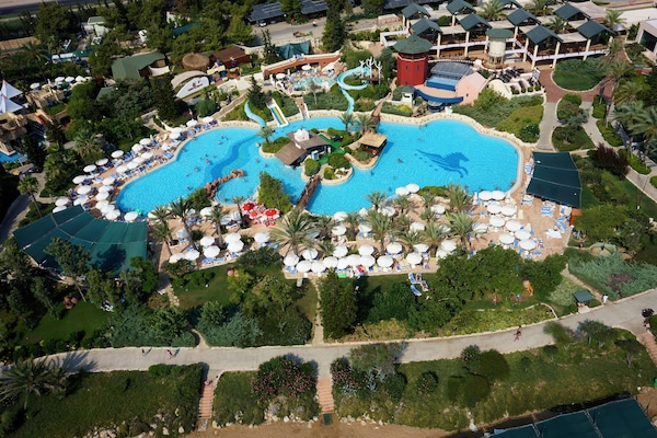 2 outdoor pools, open 7:00 AM to 8:00 PM, pool umbrellas, sun loungers