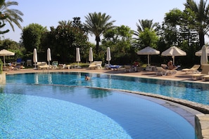 Indoor pool, seasonal outdoor pool, pool umbrellas, pool loungers