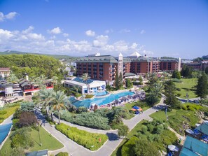 Indoor pool, seasonal outdoor pool, pool umbrellas, sun loungers - AQI Pegasos Resort (Alanya)
