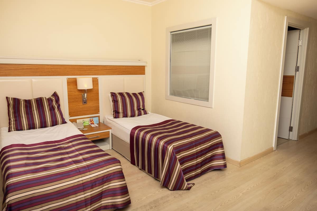 Family Room, 1 Bedroom (Partial Sea View and Second Bedroom) | Premium bedding, minibar, in-room safe, desk