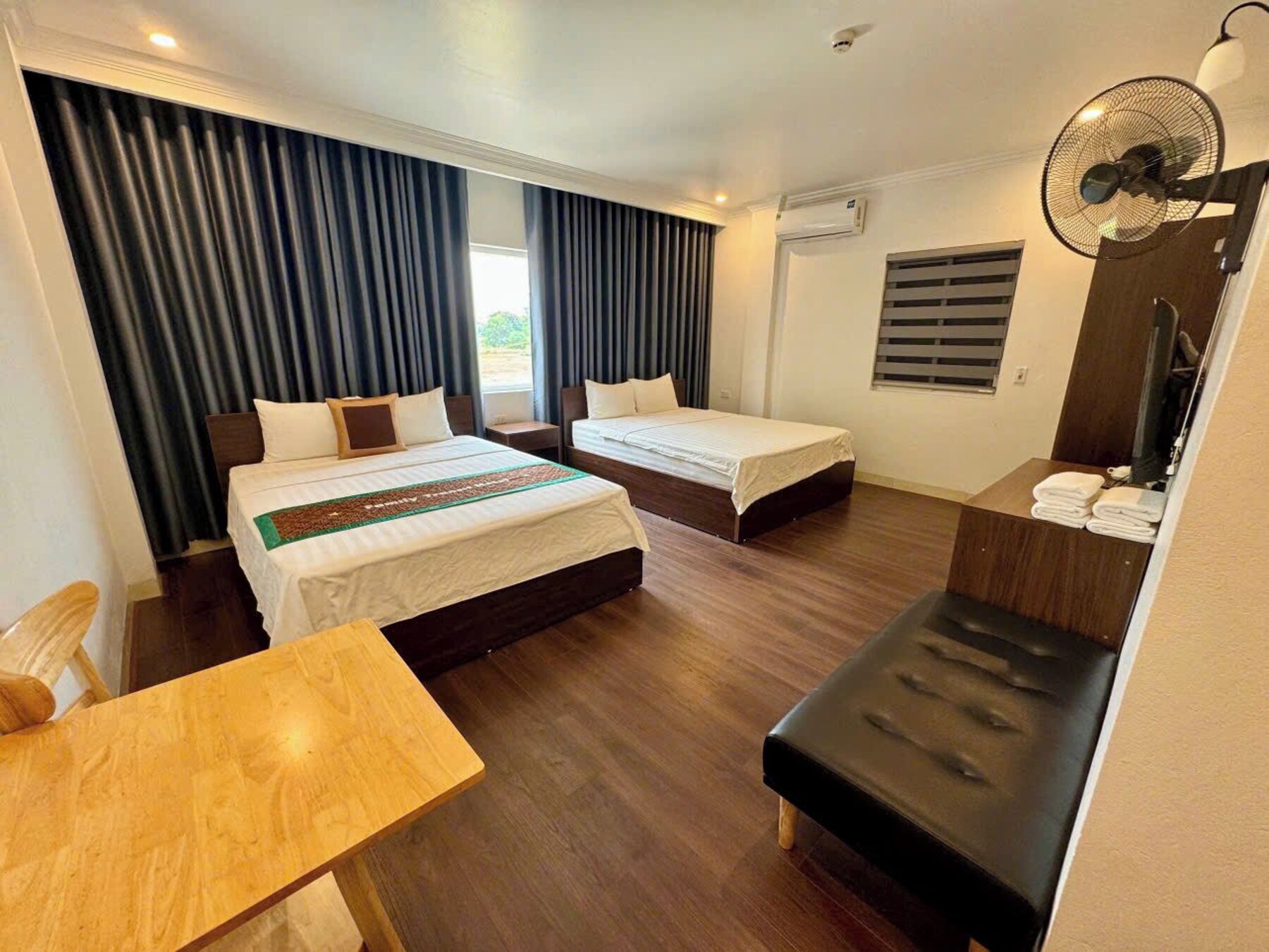 Premium bedding, memory-foam beds, minibar, desk