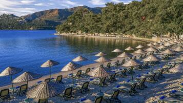 Private beach, sun loungers, beach umbrellas, beach volleyball