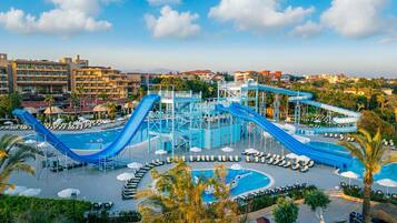 Indoor pool, outdoor pool, pool umbrellas, pool loungers