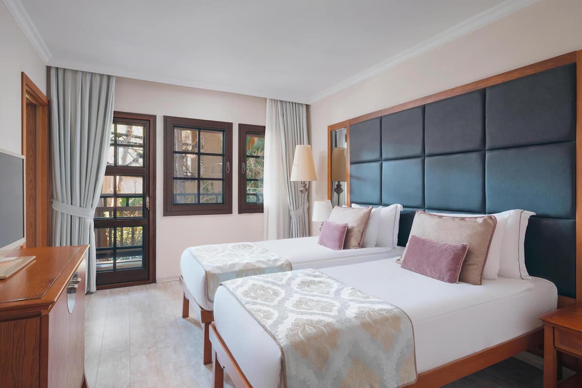 Nature Family Room | Minibar (some free items), in-room safe, soundproofing, WiFi (free)