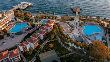 2 outdoor pools, pool umbrellas, pool loungers