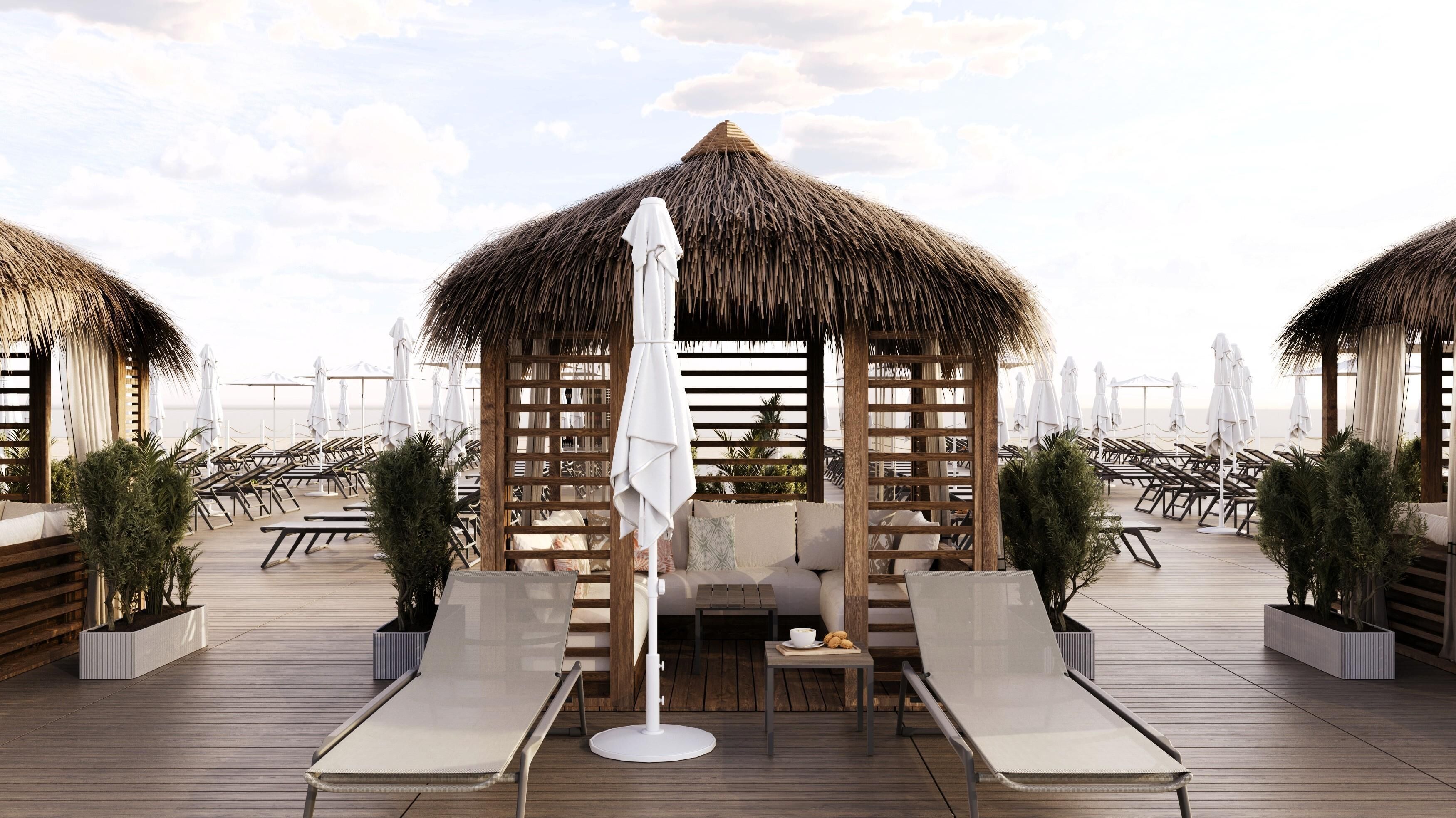 Aan een privéstrand, ligstoelen, parasols, strandlakens