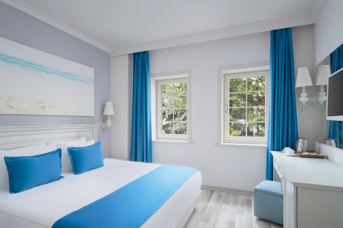 Family Room | Literie de qualité supérieure, minibar, coffres-forts dans les chambres