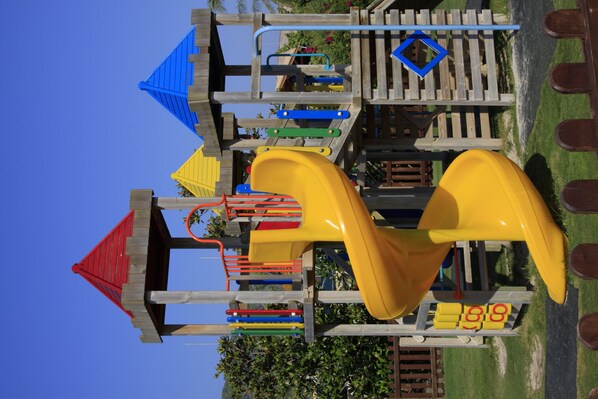 A wooden playground with slides and climbing structures. - Holiday Village Turkiye - All inclusive (Ortaca)