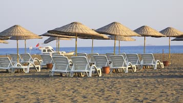 Private beach, sun-loungers, beach umbrellas, beach towels