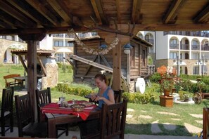 Breakfast, dinner served; Eastern European cuisine, pool views 