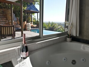 Honeymoon Double Room | Bathroom | Shower, free toiletries, hair dryer, towels