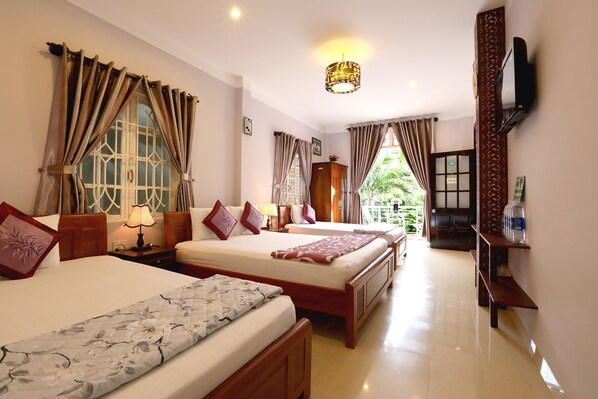 Family Room, Multiple Beds, Balcony, Garden View | View from room