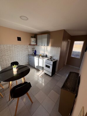 Comfort Cabin | Private kitchen | Fridge, microwave, oven, stovetop