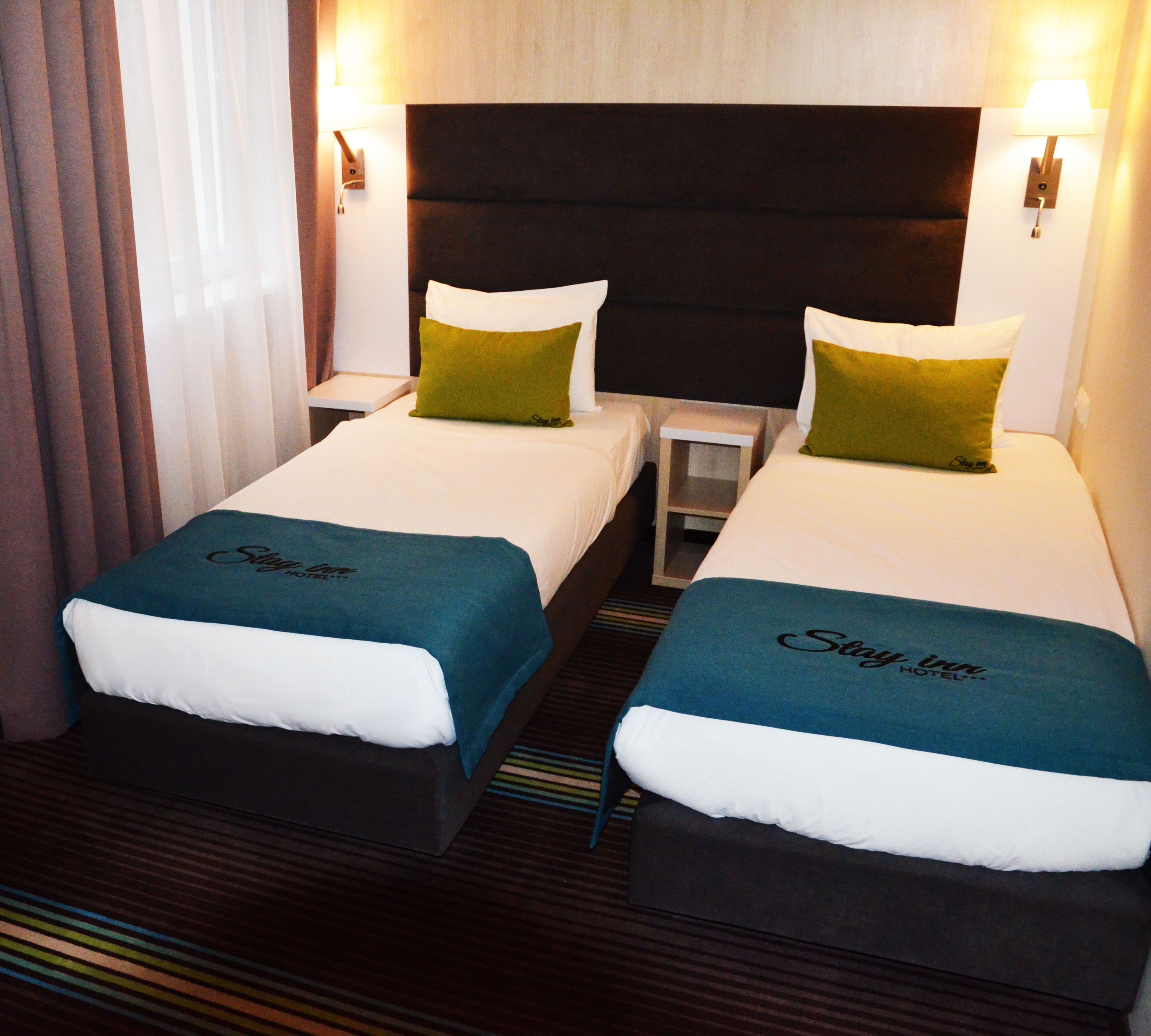 deluxe twin room | egyptian cotton sheets, premium bedding, in-room safe, desk