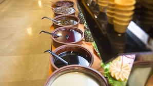 A buffet line with various food items and condiments. - Suhan Cappadocia Hotel & Spa (Avanos)