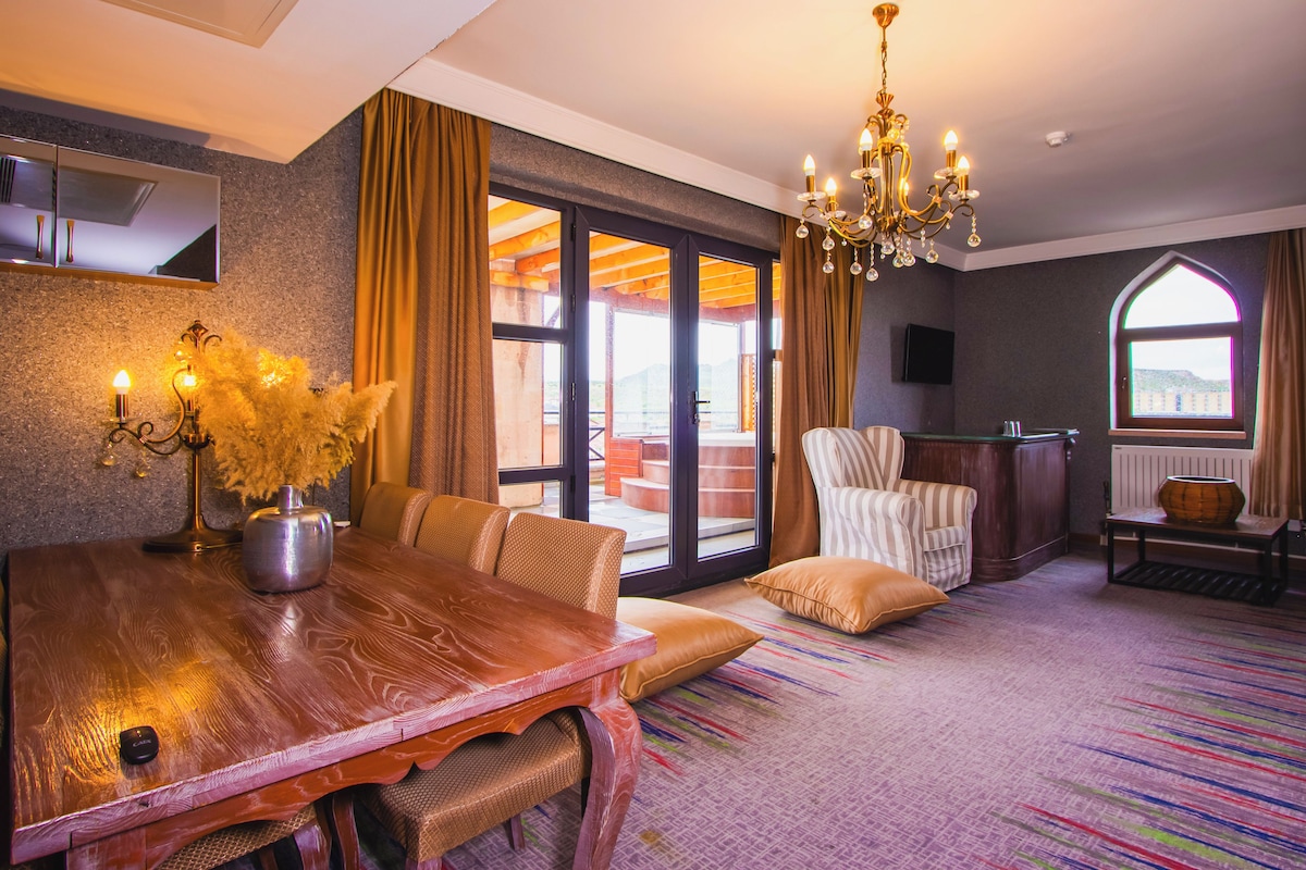Suite Deluxe | Área de sala de estar