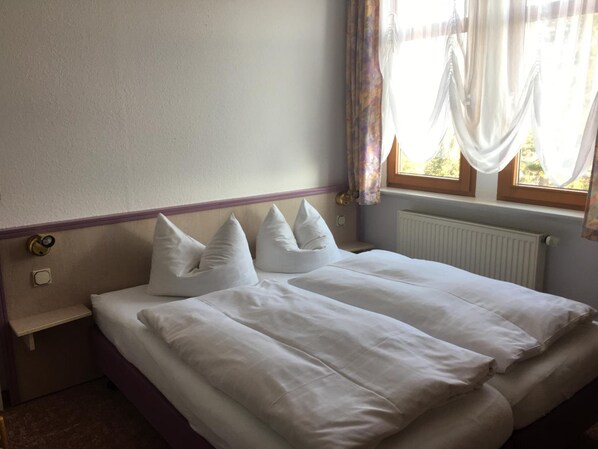 Desk, free WiFi, bed sheets