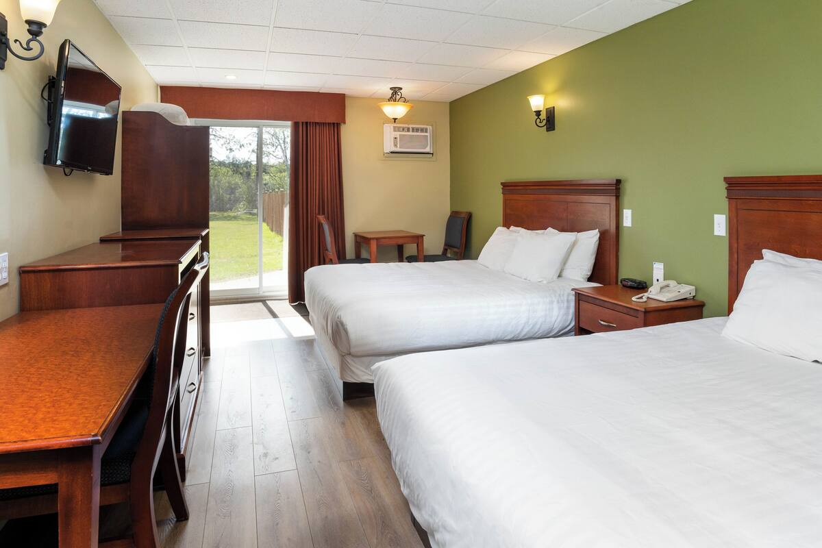 classic room, 2 queen beds, river view, front desk is open until 8 pm | desk, free wifi