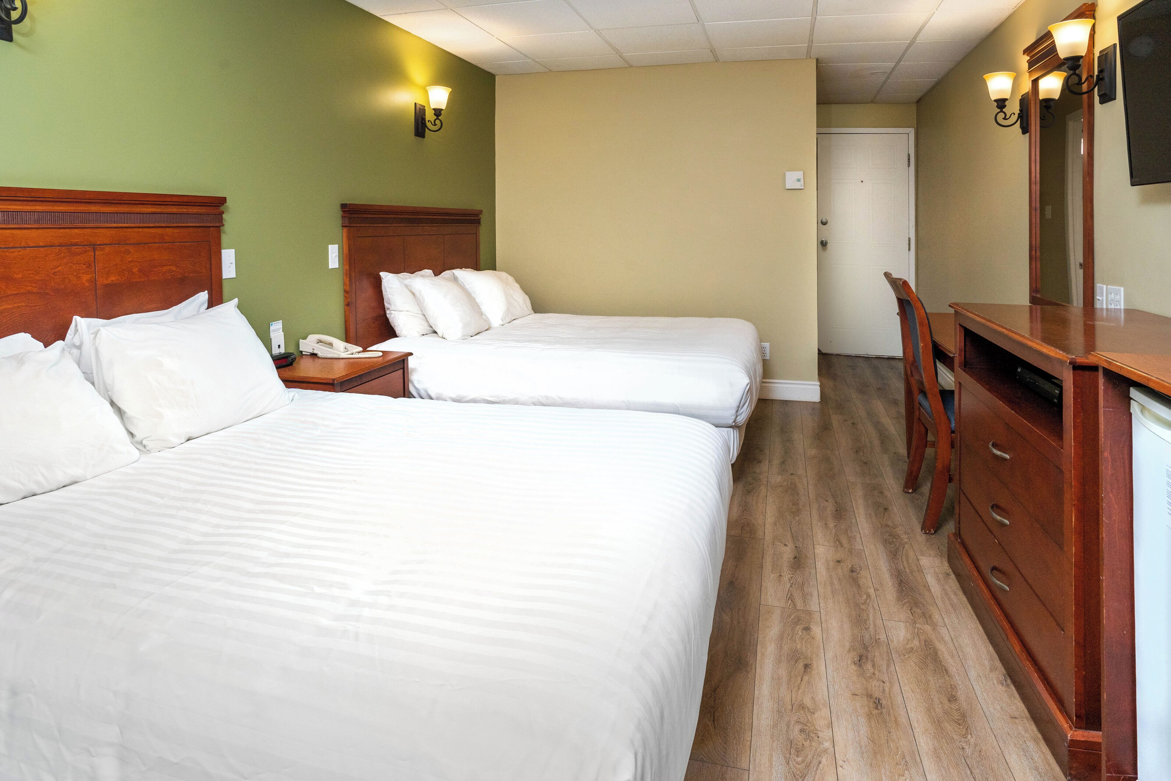 classic room, 2 queen beds, river view, front desk is open until 8 pm | desk, free wifi