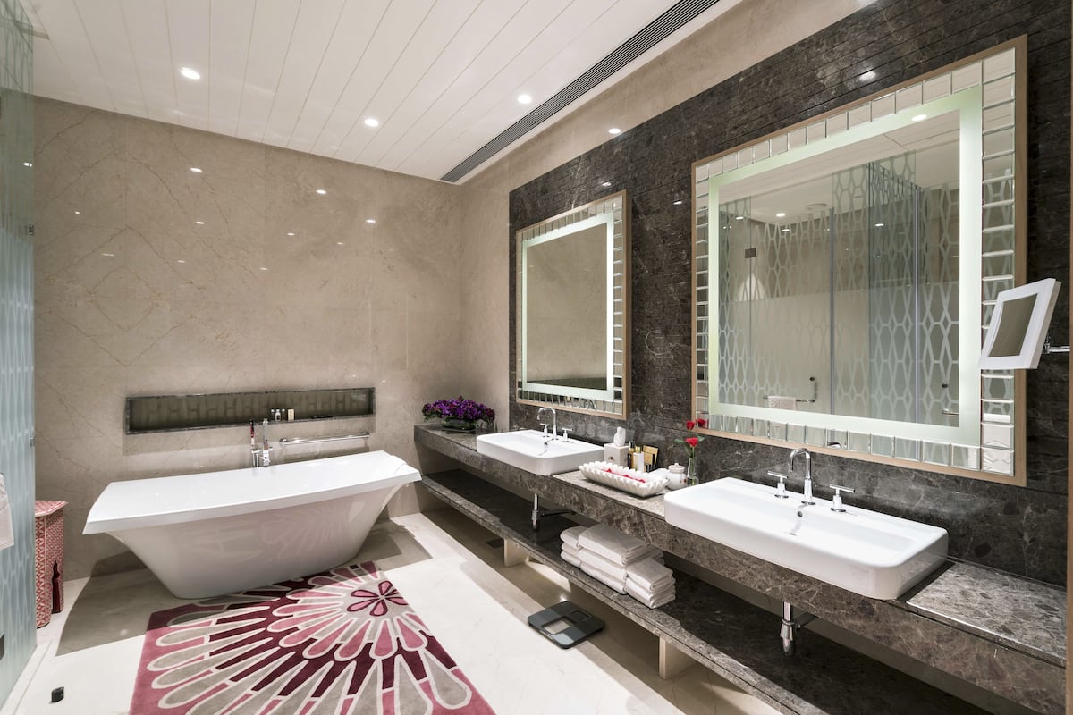 separate bathtub and shower, deep-soaking bathtub, rainfall showerhead