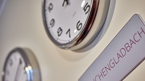 A clock with a label reading "MÖNCHENGLADBACH".
