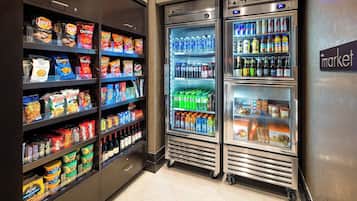 A vending machine area with snacks and beverages.