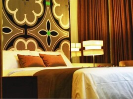 Premium bedding, in-room safe, desk, iron/ironing board (on request)